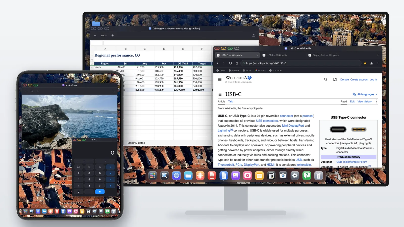 An iPhone Duo in front of an external monitor. The monitor shows a desktop with a spreadsheet and a browser window, and the Duo's inner screen shows its own workspace with a photo viewer, a calculator and a dock.