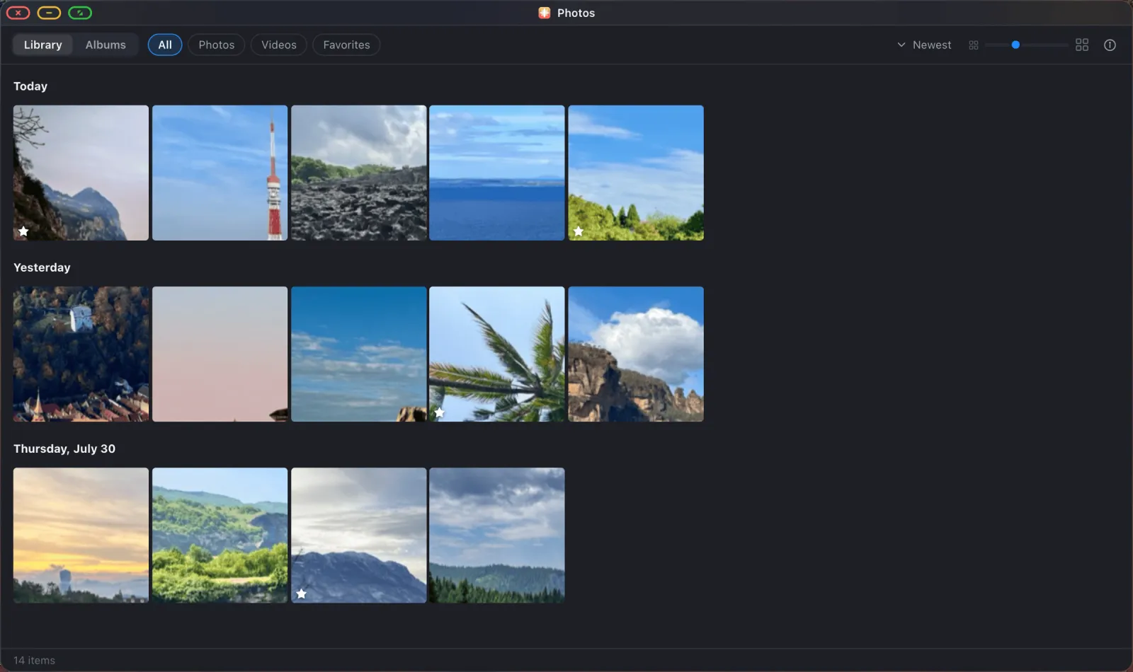The XeOS Photos app showing a grid of photos grouped by day, with Library and Albums tabs.
